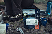 instant meal in front of a fire, greenland, arctic.