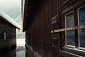 Boat huts at the frozen Koenigssee, Koenigssee, Berchtesgaden, Bavaria, Germany
