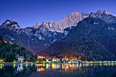Alleghe and Civetta reflecting at night in lake Lago di Alleghe, Lago di Alleghe, Dolomites, UNESCO World Heritage Site Dolomites, Venetia, Italy