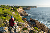 a person, coast at Cala s'Almunia, Santanyi, Mallorca, Balearic Islands, Spain