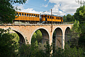 historical train near Soller, Viaduct Cinc Ponts, Mallorca, Balearic Islands, Spain
