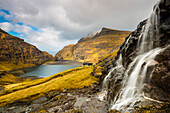 waterfall above the bay of Saksun, Streymoy, Faroe Islands, Denmark