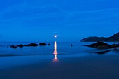 The Moon in Trengandin beach, Noja, Marismas de Santoña, Noja y Joyel Natural Park, Cantabrian Sea, Cantabria, Spain, Europe.