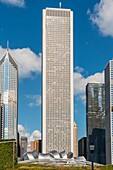 USA, IL, Chicago. The Aon Center (formerly the Standard Oil Building), 83 storey office tower in the Loop District. Jay Pritzker Pavillion, designed by architect Frank Gehry in Millennium Park, visible at the base.