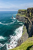 Cliffs of Moher with Breanan Mór rock on the background. Liscannor, Munster, Co. Clare, Ireland, Europe.