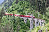 Red Bernina Express train, Filisur, Graubunden, Switzerland.