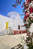 Whitewashed church and restaurant in Apollonia, Sifnos, Cyclades, Greece.