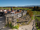 Biergarden at Kloster Reutberg with view to the Alps, Sachsenkam, Upper Bavaria, Germany