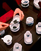 CHINA, Macau, Asia, Sands Macao Hotel, Woman serving Chinese tea, close-up