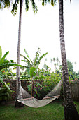 FRENCH POLYNESIA, Moorea. A hammock at the Te Nunoa Private Garden Bungalow.