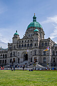 Tourists And Locals Gather On The Parliament Grounds; Victoria, British Columbia, Canada