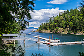 Boat Tours Run In And Out Of Butchart Cove, Vancouver Island; Victoria, British Columbia, Canada