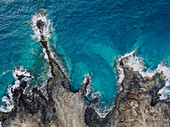 Aerial view of beautiful natural scenery of volcanic rocks on seashore, Lanzarote, Canary Islands, Spain