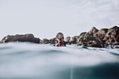 Woman swimming in scuba mask in sea, Tenerife, Canary Islands, Spain