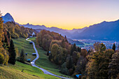 Wamberg, Garmisch Partenkirchen, Bavaria, Germany, Europe, Wamberg village at dusk, Garmisch Partenkirchen and Zugspitze mountain in the background
