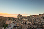 View of the ancient town and historical center called Sassi perched on rocks on top of hill, Matera, Basilicata, Italy, Europe