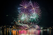 Fireworks during Madonna della Neve festival on Pusiano Lake, Pusiano, Como province, Lombardia, Italy, Europe