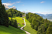 Wamberg village with Mount Zugspitze and Waxenstein on the background, Garmisch Partenkirchen, Bayern, Germany.