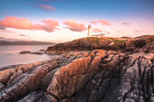 Fanad Head (Fánaid) lighthouse, County Donegal, Ulster region, Ireland, Europe, Pink sunset at Fanad Head