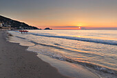 Sunrise on Alassio beach and Gallinara Island, Alassio, Savona province, Liguria, Italy