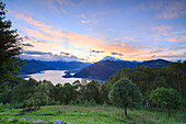 Pink sky at dawn on Lake Como seen from Cremia San Domenico Lombardy Italy Europe