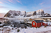 Small dock at Reine at sunrise in winter, lofoten islands, nordland, norway, europe