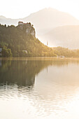 The CBled Castle and Lake Bled during sunrise, Bled, Upper Carniolan region, Slovenia