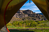 Scenic view of mountain from inside tent