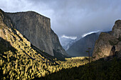 Yosemite Valley famous tunnel view and setting sun.