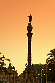 Barcelona, Columbus Monument, Passeig Maritime, sunset