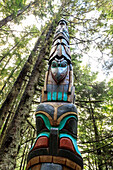 Yaadaas Crest Corner Pole, Tlingit totem pole, rainforest, Sitka National Historic Park, Sitka, Baranof Island, Alaska, United States of America, North America