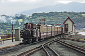 Narrow gauge Blaenau Ffestiniog railway station at Porthmadog, train arriving, Llyn Peninsular, Gwynedd, Wales, United Kingdom, Europe