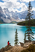 Lone traveller at Moraine Lake and the Valley of the Ten Peaks, Banff National Park, UNESCO World Heritage Site, Canadian Rockies, Alberta, Canada, North America