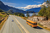 Yellow school bus on The Sea to Sky Highway near Squamish, British Columbia, Canada, North America