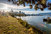 View of city skyline and Vancouver Lookout Tower from CRAB Park at Portside, Vancouver, British Columbia, Canada, North America