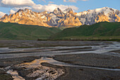 River coming from Kel-Suu mountain range at sunset, Kurumduk valley, Naryn province, Kyrgyzstan, Central Asia, Asia