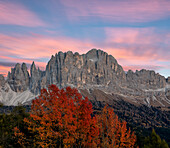 Sunrise on Catinaccio Rosengarten and Torri Del Vajolet in autumn, Tires Valley, Dolomites, South Tyrol, Bolzano province, Italy, Europe