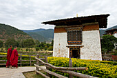 Buddhist monks of the Punakha Fortress Monastery, Paro, Bhutan, Asia