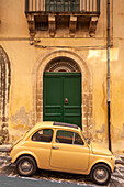 Old Fiat 500 parked in street, Noto, Sicily, Italy, Europe