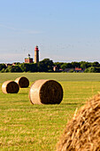 Straw bales in front of lighthouses of Cape Arkona, Rügen, Baltic Sea coast, Mecklenburg-Vorpommern, Germany