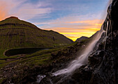 Panoramic of waterfall at sunset, Saksun, Streymoy Island, Faroe Islands, Denmark, Europe