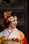 Japanese woman dressed in traditional kimono, Kyoto, Japan, Asia