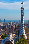 Park Guell houses at Park Guell by architect Antoni Gaudi, UNESCO World Heritage Site, with views over the city to the sea, Barcelona, Catalonia, Spain, Europe