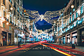 Festive Christmas lights in Regent Street at night in 2017, London, England, United Kingdom, Europe