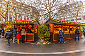 Christmas Market Stalls and William Shakespeare Fountain in Leicester Square, London, England, United Kingdom, Europe