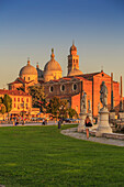 View of Santa Giustina Basilica visible from Prato della Valle during golden hour, Padua, Veneto, Italy, Europe