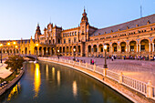 Plaza de Espana at dusk, built for the Ibero-American Exposition of 1929, Seville, Andalucia, Spain, Europe