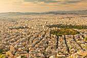 View of North Athens suburbs from Likavitos Hill in late afternoon, Athens, Greece, Europe