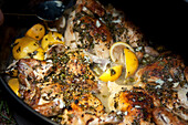 Roasted chicken with lemon, cooked with a camp overn