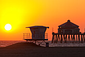 Silhouette of lifeguard tower at Huntington Beach, Orange County, California, USA